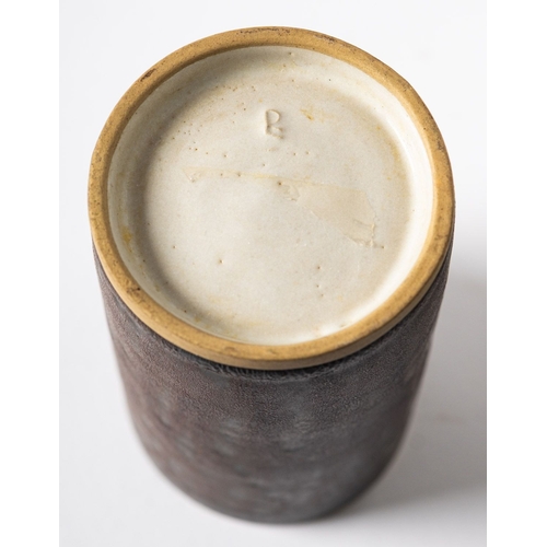 24 - *Dame Lucie Rie DBE [1902-1995] a stoneware cylinder vase or beaker, with manganese glazed exterior ... 