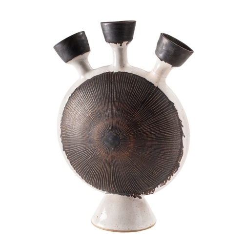 36 - *Dame Lucie Rie DBE [1902-1995] a stoneware composite bottle, the disc shaped body with triple necks... 