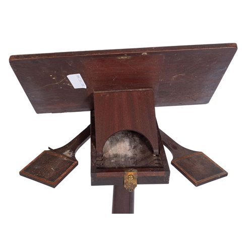 A George II mahogany library reading table, mid 18th century; the ...