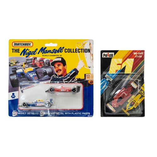 625 - Yaxon and others. A boxed group of various Formula One cars, two Ferrari 312 T2, Minichamps Vodaphon... 