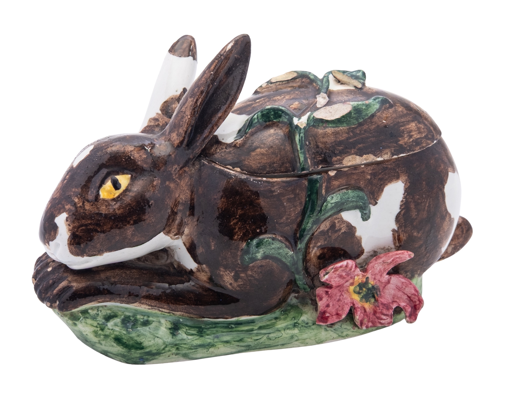 A Continental faience tureen and cover in the form of a crouching ...