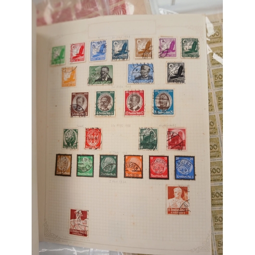 101 - World. An accumulation of stamps in four bags-for-life including, useful Austria in one country albu... 