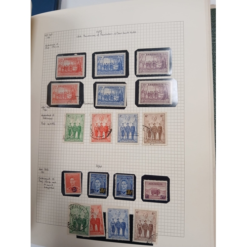 104 - Great Britain and World. A collection of stamps in seven volumes, including Great Britain with early... 