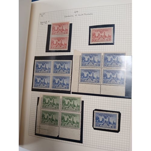 104 - Great Britain and World. A collection of stamps in seven volumes, including Great Britain with early... 