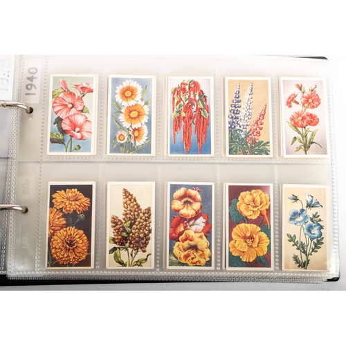 13 - An album of Godfrey Phillips cigarette cards, various sets and part sets including 'Ships That have ... 