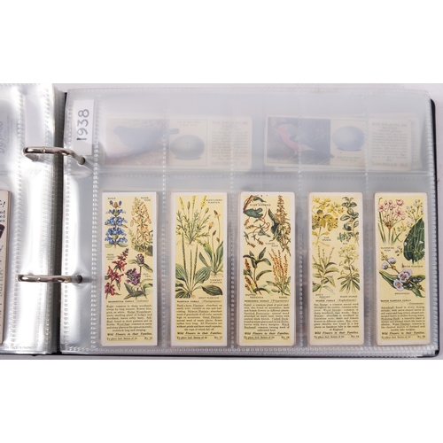 17 - Ty-phoo and others. Four albums of various trade cards, various subject matter and publishers.