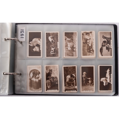 17 - Ty-phoo and others. Four albums of various trade cards, various subject matter and publishers.