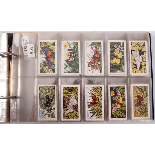 17 - Ty-phoo and others. Four albums of various trade cards, various subject matter and publishers.