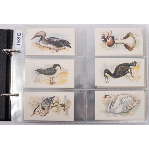 17 - Ty-phoo and others. Four albums of various trade cards, various subject matter and publishers.