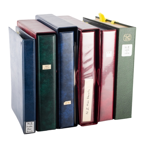 18 - New Zealand. A collection of New Zealand stamps in six albums, comprising a Hingeless Queen Victoria... 