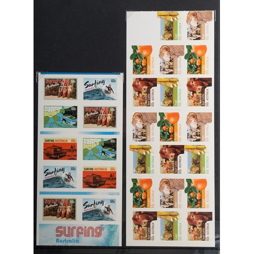 19 - Australia. A collection of Australian stamps in three volumes, with KGV Kangaroos, later issues thro... 
