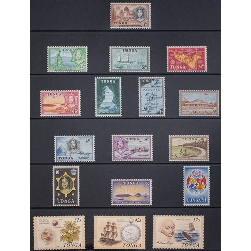 43 - British Commonwealth. A collection in four albums including Tonga, 1937 coronation omnibus, Seychell... 