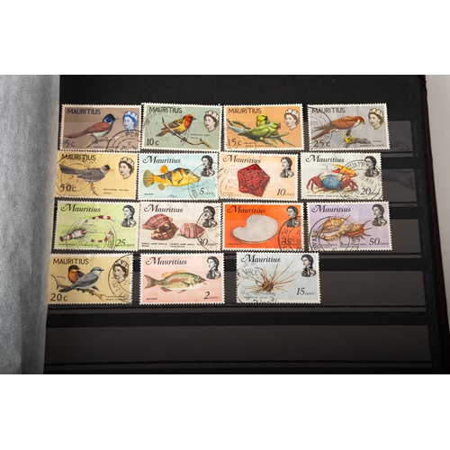 70 - World. A box of world stamps, including IOM FDCs, general albums, but includes a small stock-book of... 