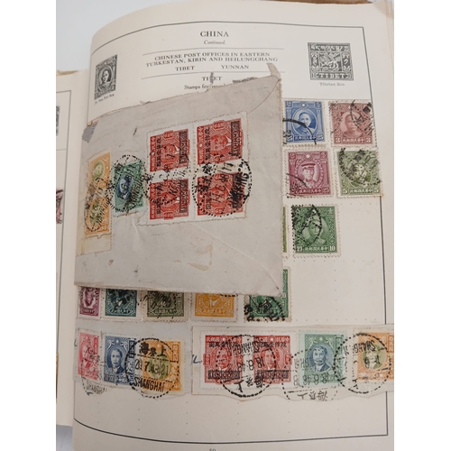 88 - Old Time. A world collection in two volumes, comprising an old International Stamp Album ( front and... 