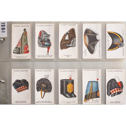 9 - Five albums of sets and parts sets of Players cigarette cards,  various subject matter arranged in a... 