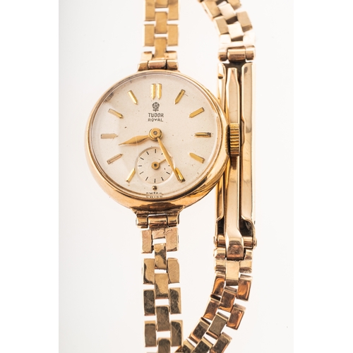 440 - Tudor Royal, a 9K gold lady's wristwatch the round dial having raised baton numerals, gold Dauphine ... 