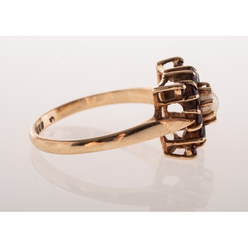827 - A vintage 9ct gold garnet and pearl cluster, of square form, claw set to the centre with a cultured ... 