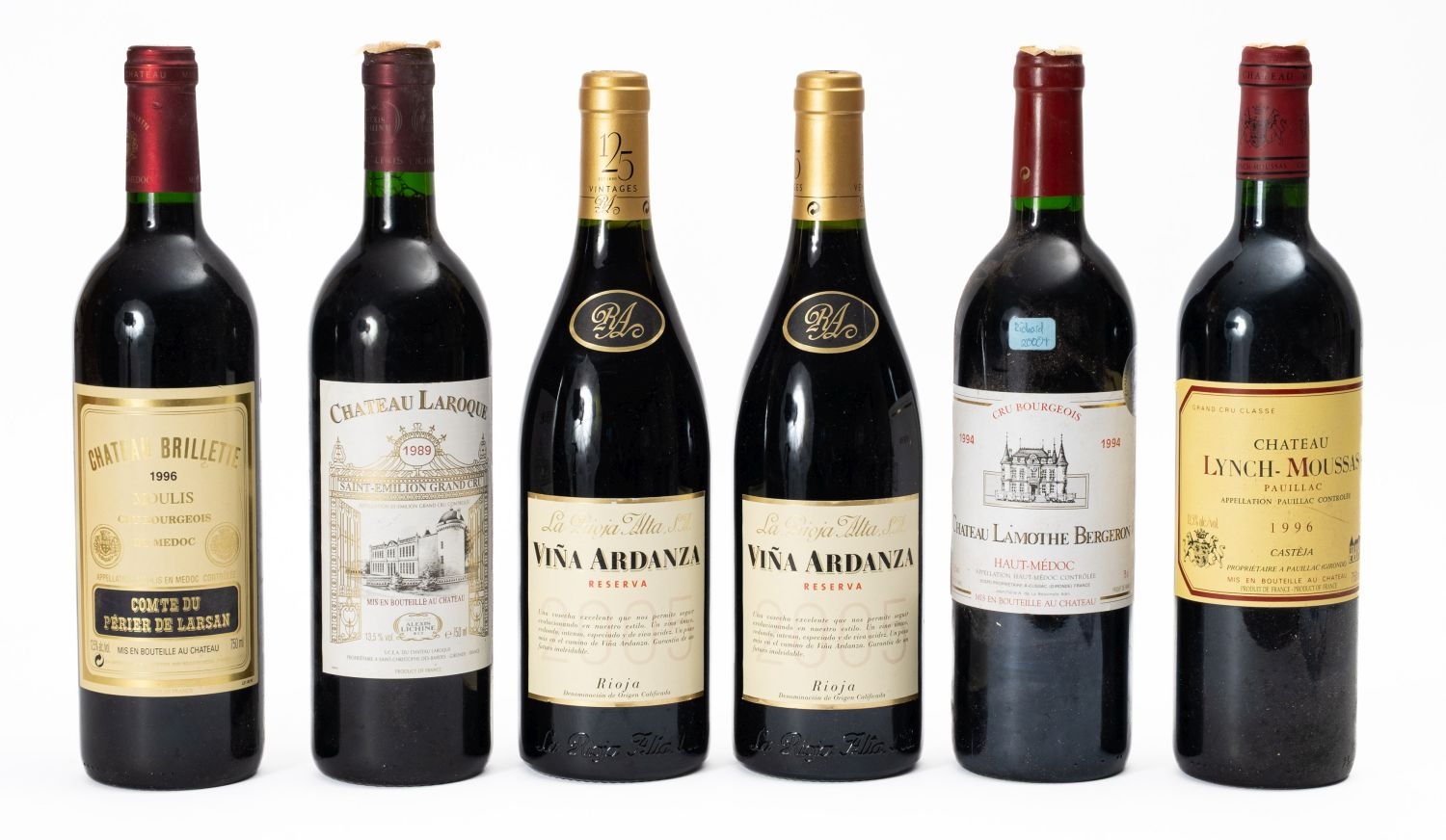 A group of six bottles of red wine. Comprising two bottles of La Rioja ...