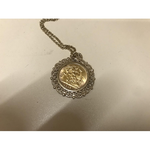 175 - 1915 Half Sovereign coin in 9ct gold mount & 9ct 18