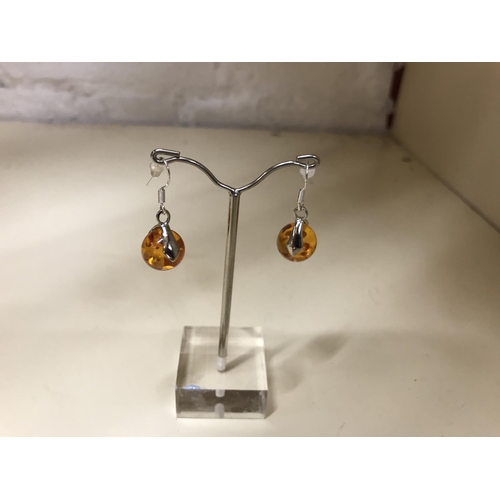 132 - 925 Silver & Pressed Amber earrings