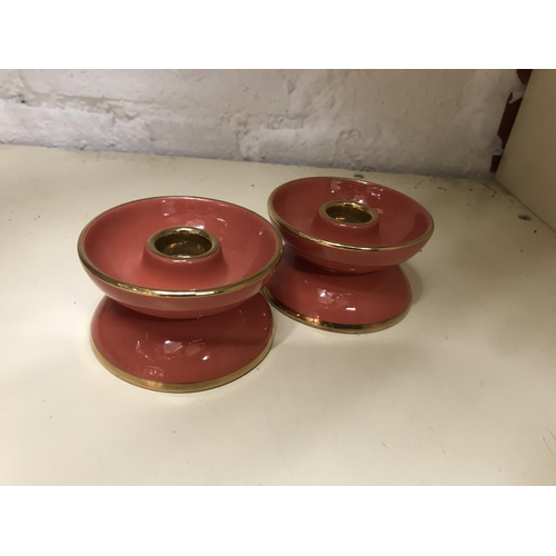 141 - Pair of small Carlton ware candle holders