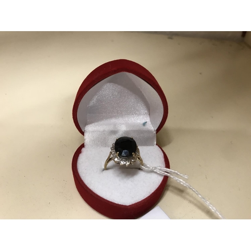 142 - 9ct gold, Diamond & Jet ring