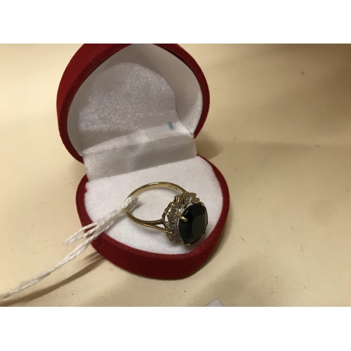 142 - 9ct gold, Diamond & Jet ring