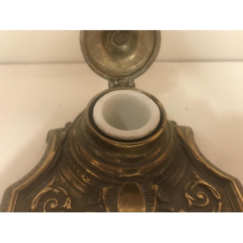 293 - French Brass Inkwell with porcelain liner, some nibbles