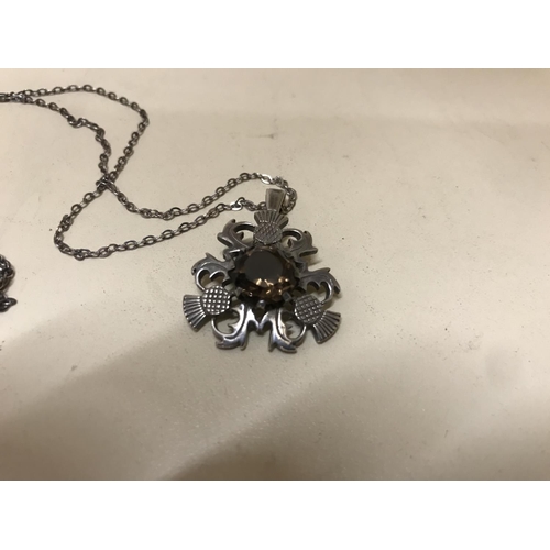 240 - Hall Marked Silver Thistle pendant with Smokey Quartz stone on 925 chain, Edinburgh marks