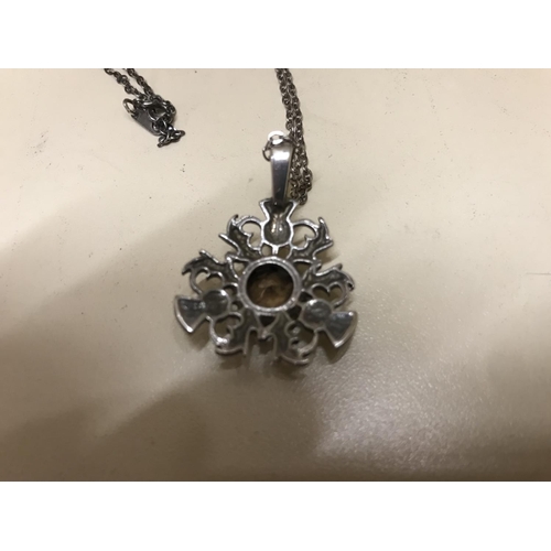 240 - Hall Marked Silver Thistle pendant with Smokey Quartz stone on 925 chain, Edinburgh marks