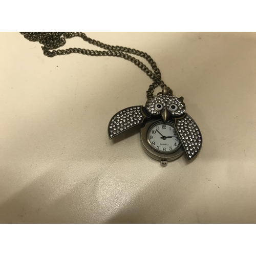 126 - Jewelled 'Owl' watch on large chain, working order