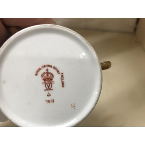 250 - Royal Crown Derby Tyg, one handle repaired, 2