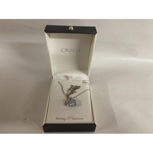 128 - Sterling Silver & Blue Topaz Pendant & Chain