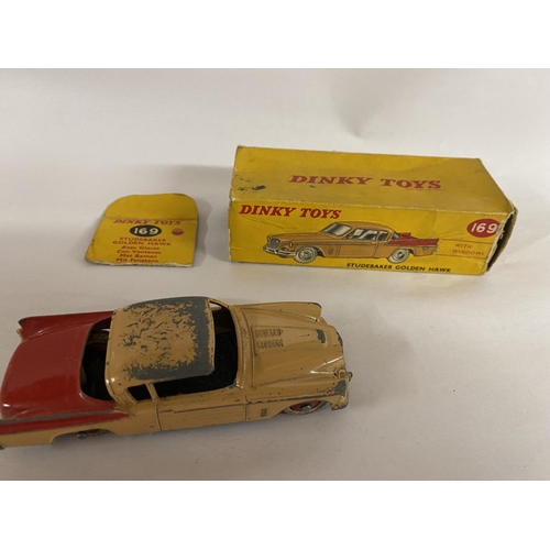 56 - Dinky Studebaker Golden Hawk, model 169 - Box Worn, Car Very Playworn, no windows