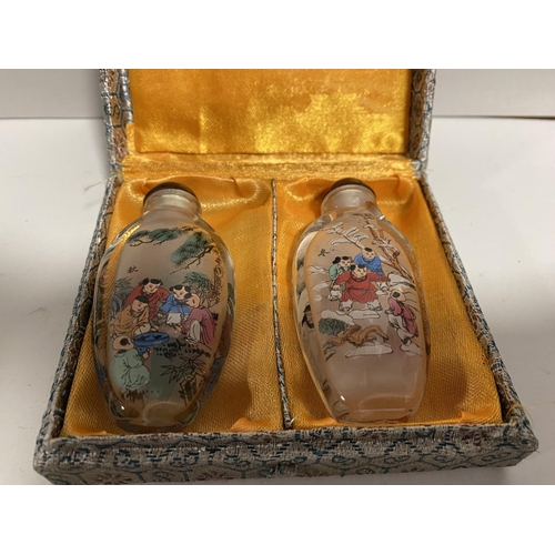 124 - 2 x Chinese Reverse Painted Scent / Snuff Bottles - Oriental Scenes