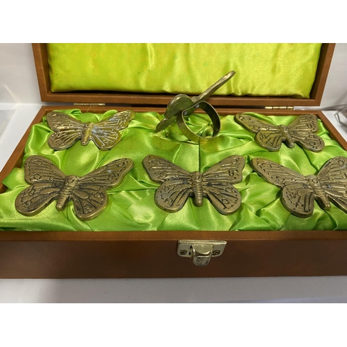 100 - Vintage Cased Set of Brass Butterfly Napkin Rings, some ageing