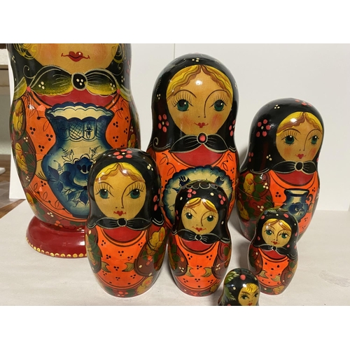 195 - Vintage Handpainted 7-Piece Stacking Russian Doll Set - Largest 9