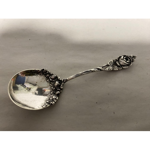 74 - Silver (800) Grade Rose Handled Spoon