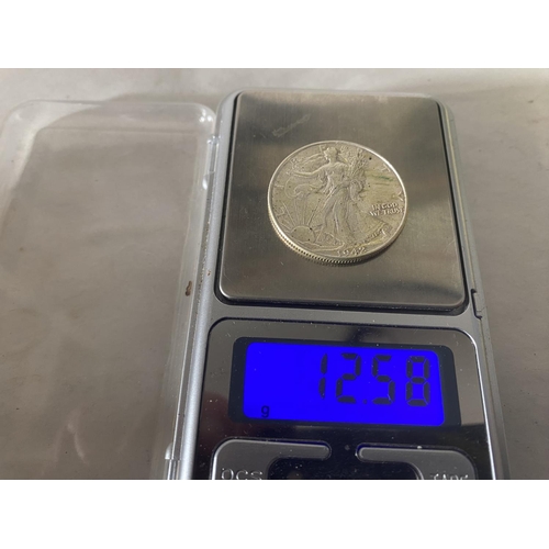 98 - 1942 Walking Liberty .900 Silver Haf Dollar