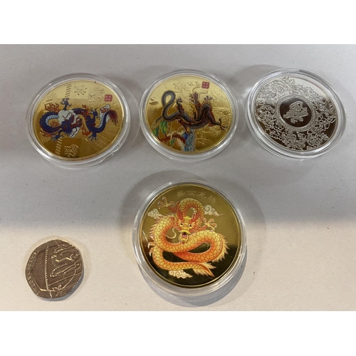 73 - 4 x Chinese Year of the Dragon Coins in Capsules