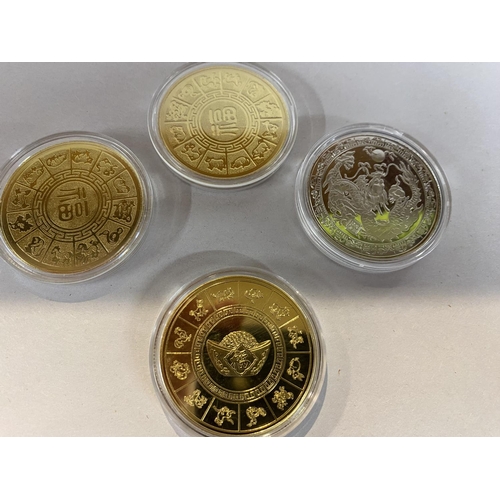 73 - 4 x Chinese Year of the Dragon Coins in Capsules