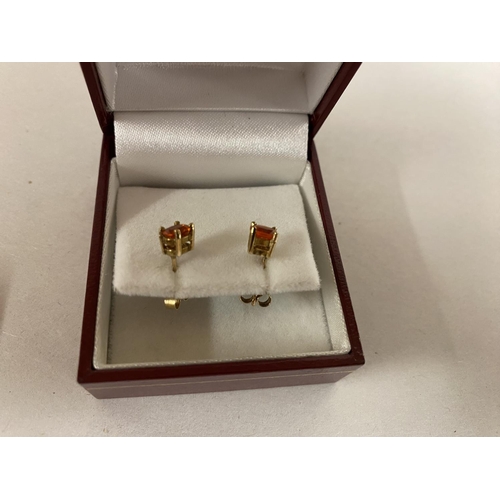 141 - 9ct Gold & Orange Topaz Stud earrings