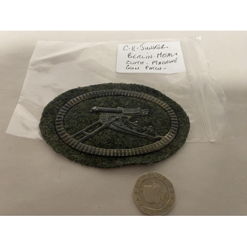 166 - C E Junker, Berlin - Metal & Cloth Machine Gun Patch