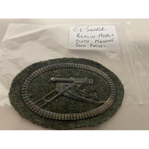 166 - C E Junker, Berlin - Metal & Cloth Machine Gun Patch