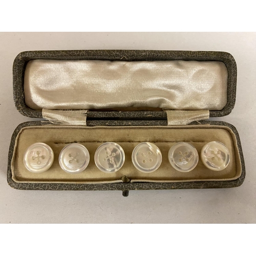 145 - set of MOP Buttons in Leather Case