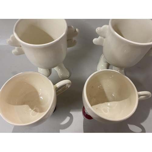 52 - 4 x Carlton Ware Walking Mugs