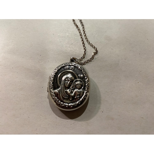 24 - Continental Silver Locket with 18