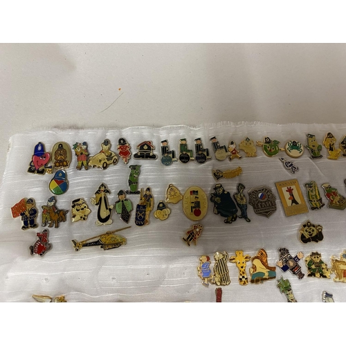 212 - Large Quantity of Pin Badges inc. Rupert, Police, Cartoons etc