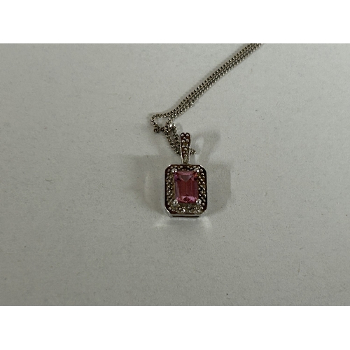 230 - 9ct White Gold & Pink Sapphire & Small Diamond Pendant & Chain - Weight 2g