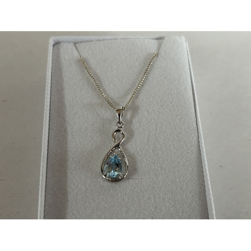 204 - 925 Silver & Blue Topaz Pendant & Chain - 40cm